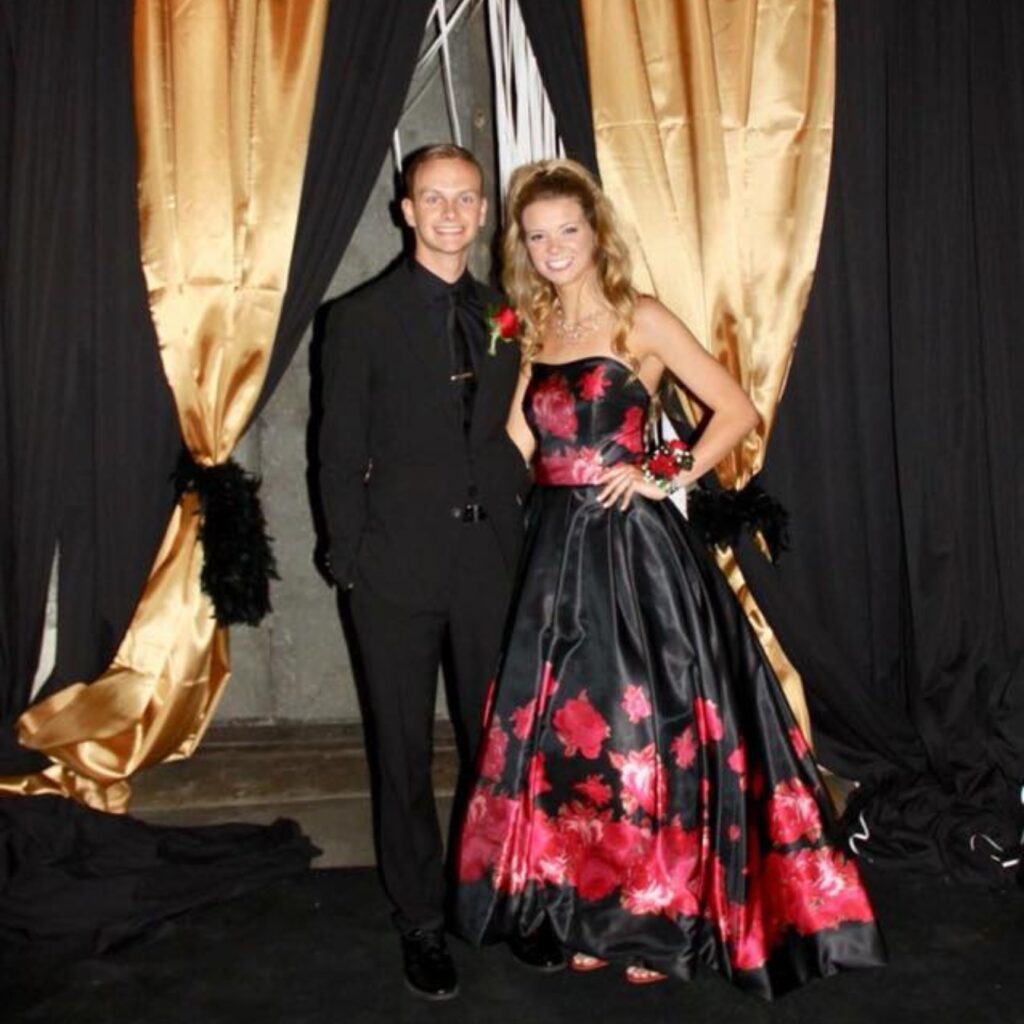 red and black prom dress at prom